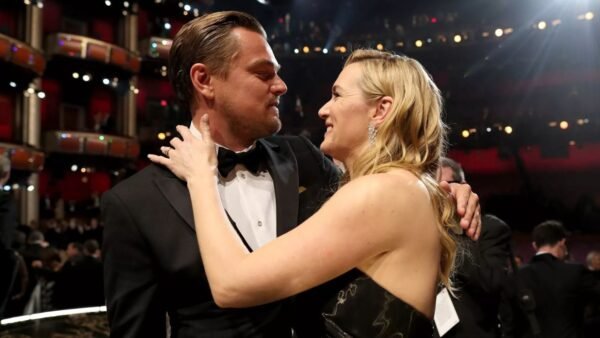 Kate Winslet and Leonardo DiCaprio on a red carpet event
