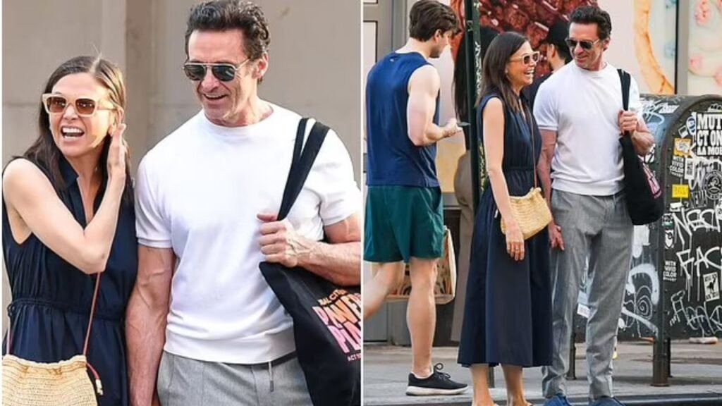 Hugh Jackman holding hands with actress Sutton Foster